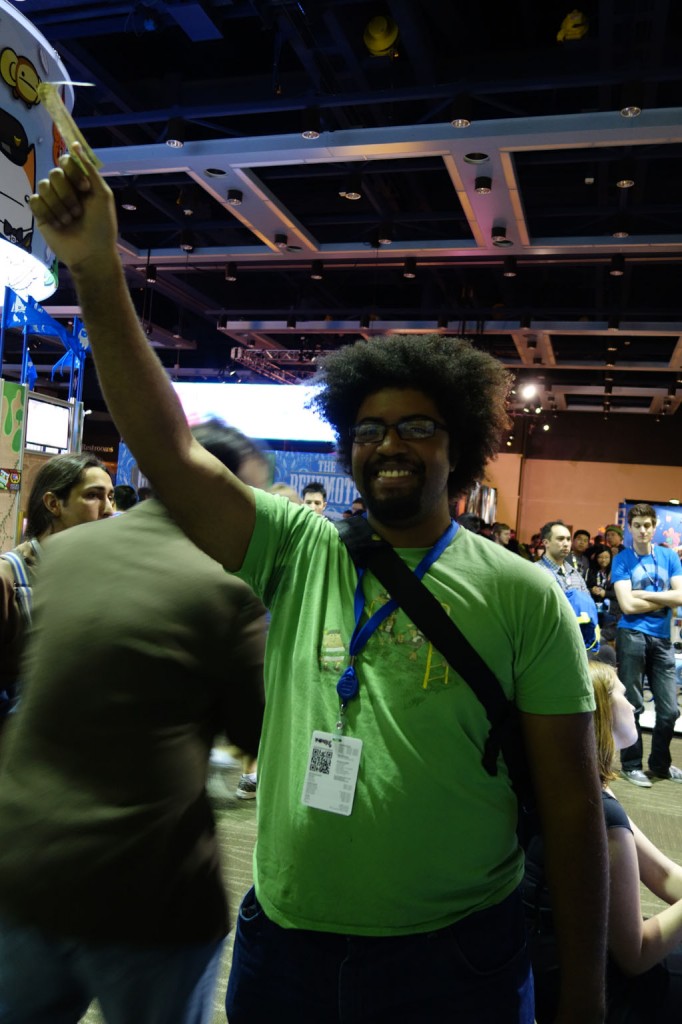 A conventiongoer purchases the game immediately on hearing the premise